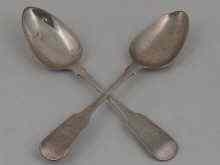 Appraisal: Channel Islands silver A pair of Fiddle pattern tablespoons by