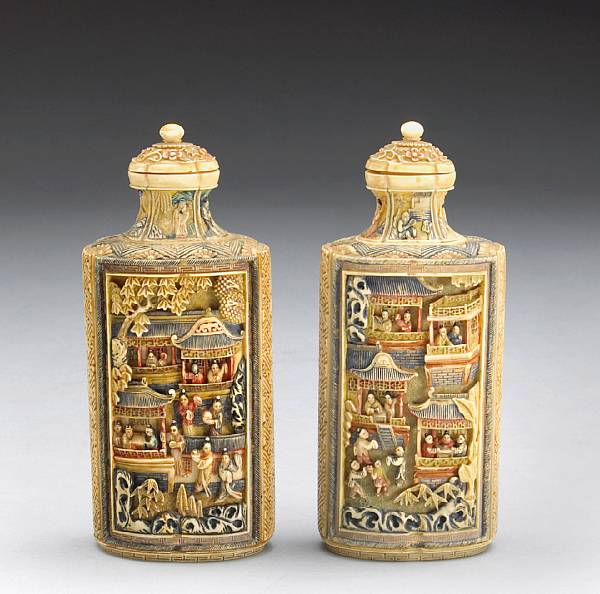 Appraisal: A pair of pieced and tinted ivory cabinet bottles Late