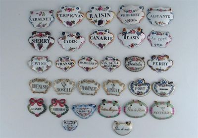 Appraisal: A collection of thirty wine labels nineteen enamel and eleven