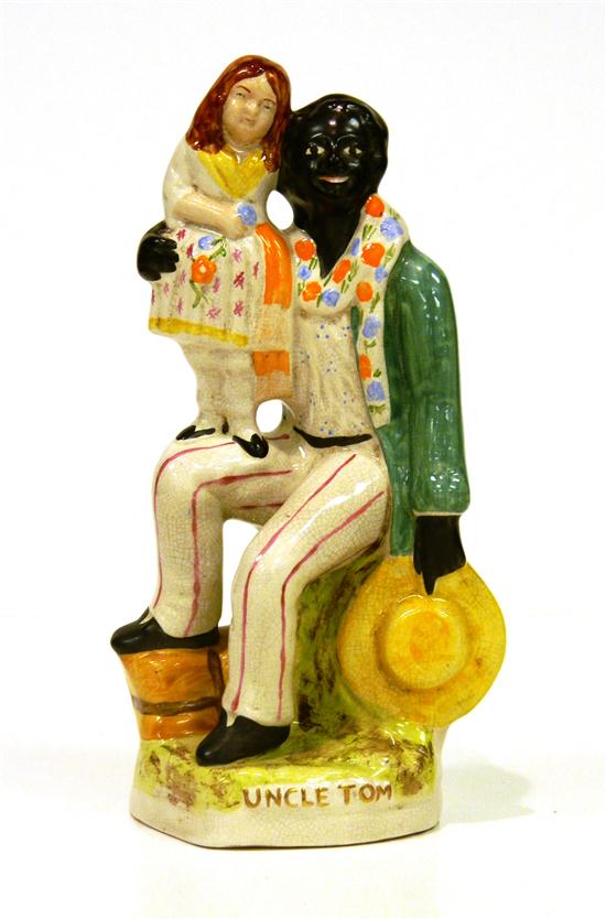 Appraisal: th C Staffordshire figural group depicting Uncle Tom and Eva