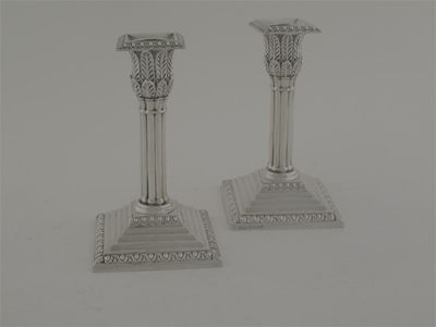 Appraisal: A pair of Victorian dwarf candlesticks with cluster columns and