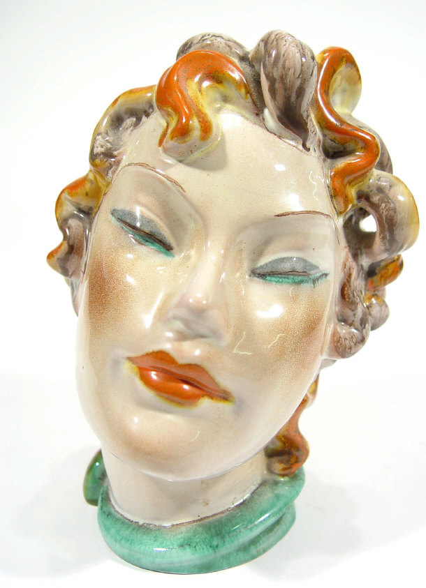 Appraisal: Continental Art Deco pottery bust with hand painted decoration impressed