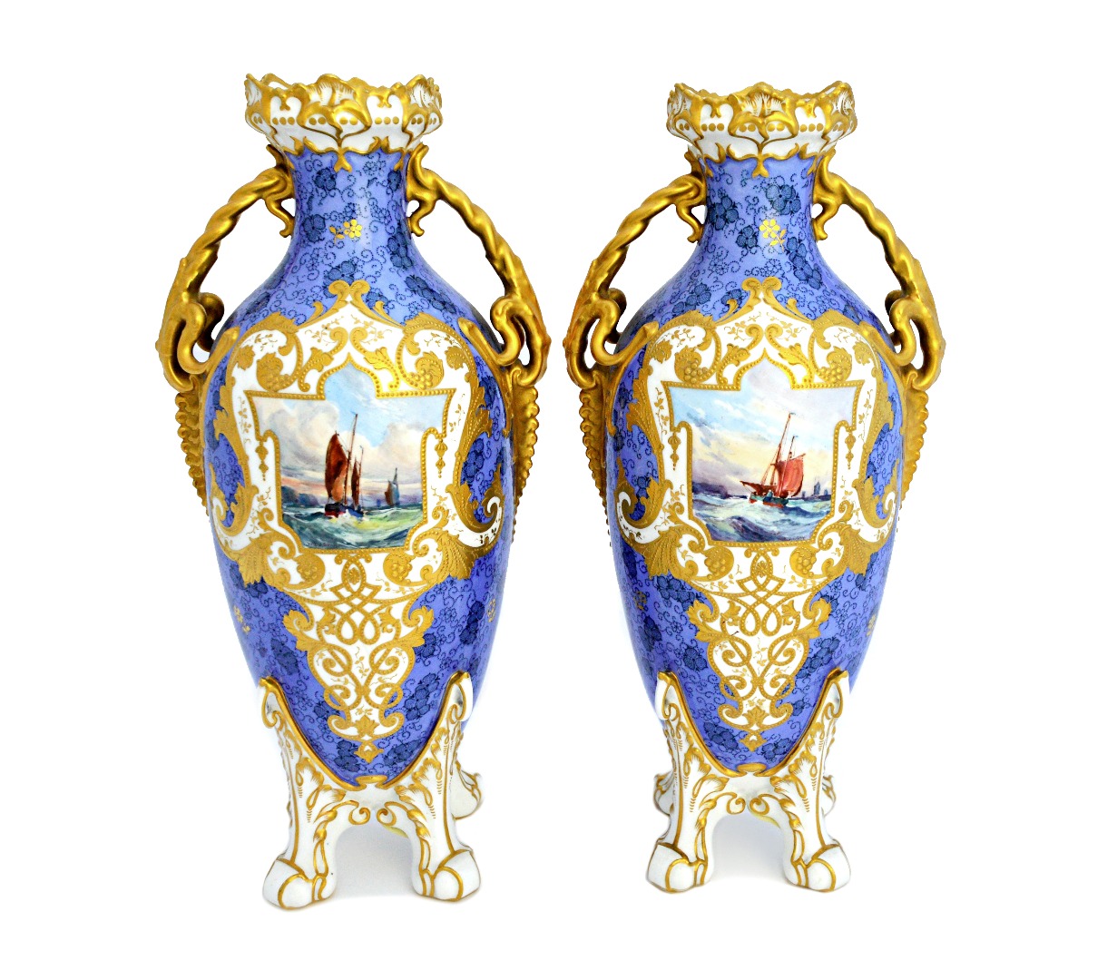 Appraisal: A pair of Royal Crown Derby two-handled vases with iron