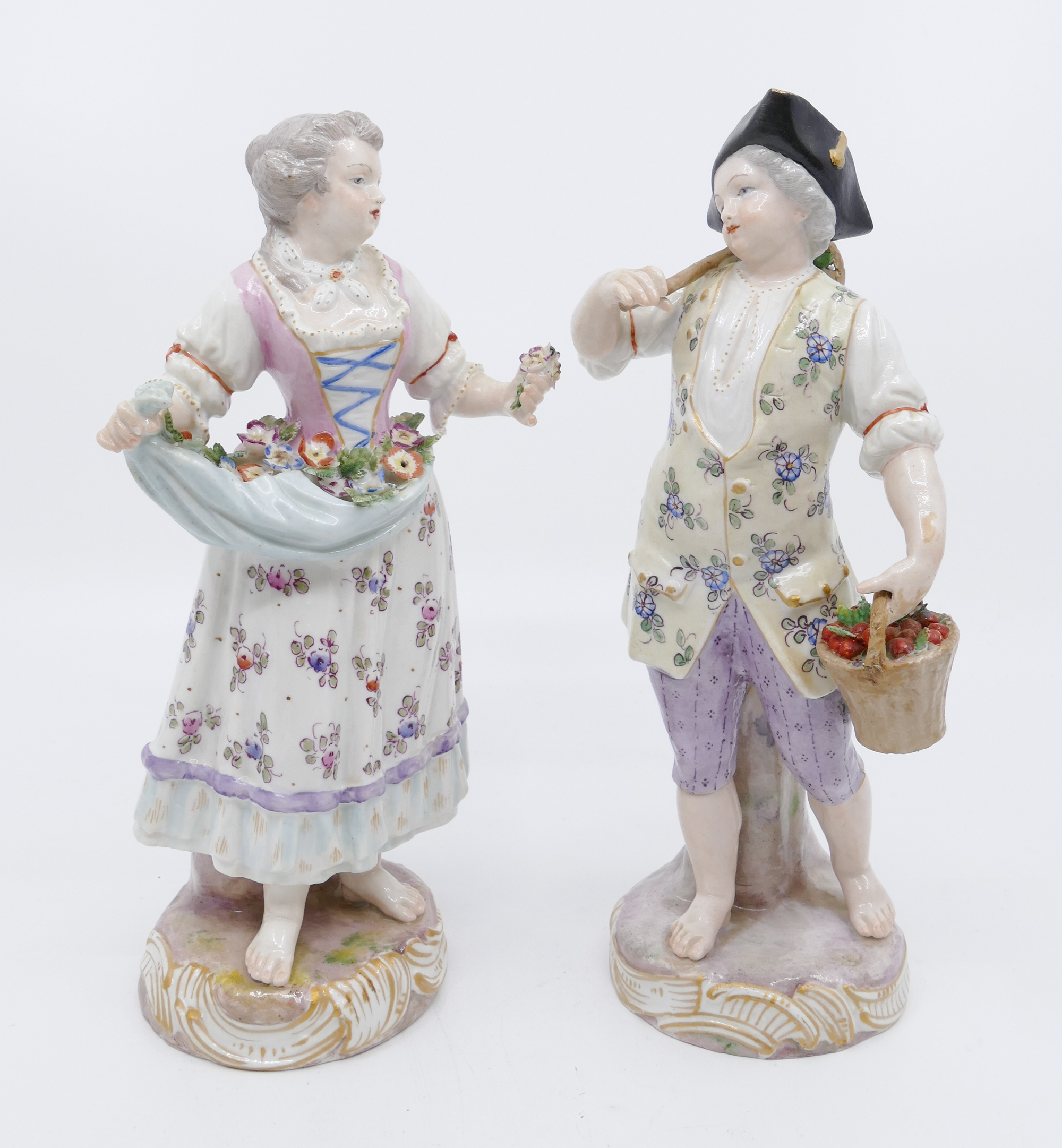 Appraisal: Pair English or German Porcelain Figurines of Man Woman Possibly