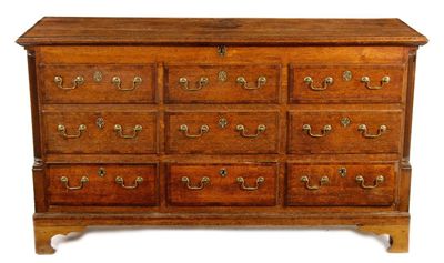 Appraisal: A Lancashire oak mule chest with mahogany cross banding the