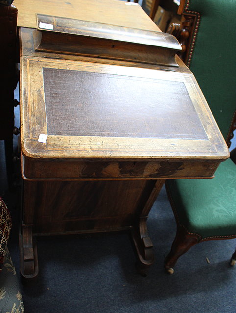 Appraisal: A VICTORIAN ROSEWOOD DAVENPORT DESK with pen box top fall