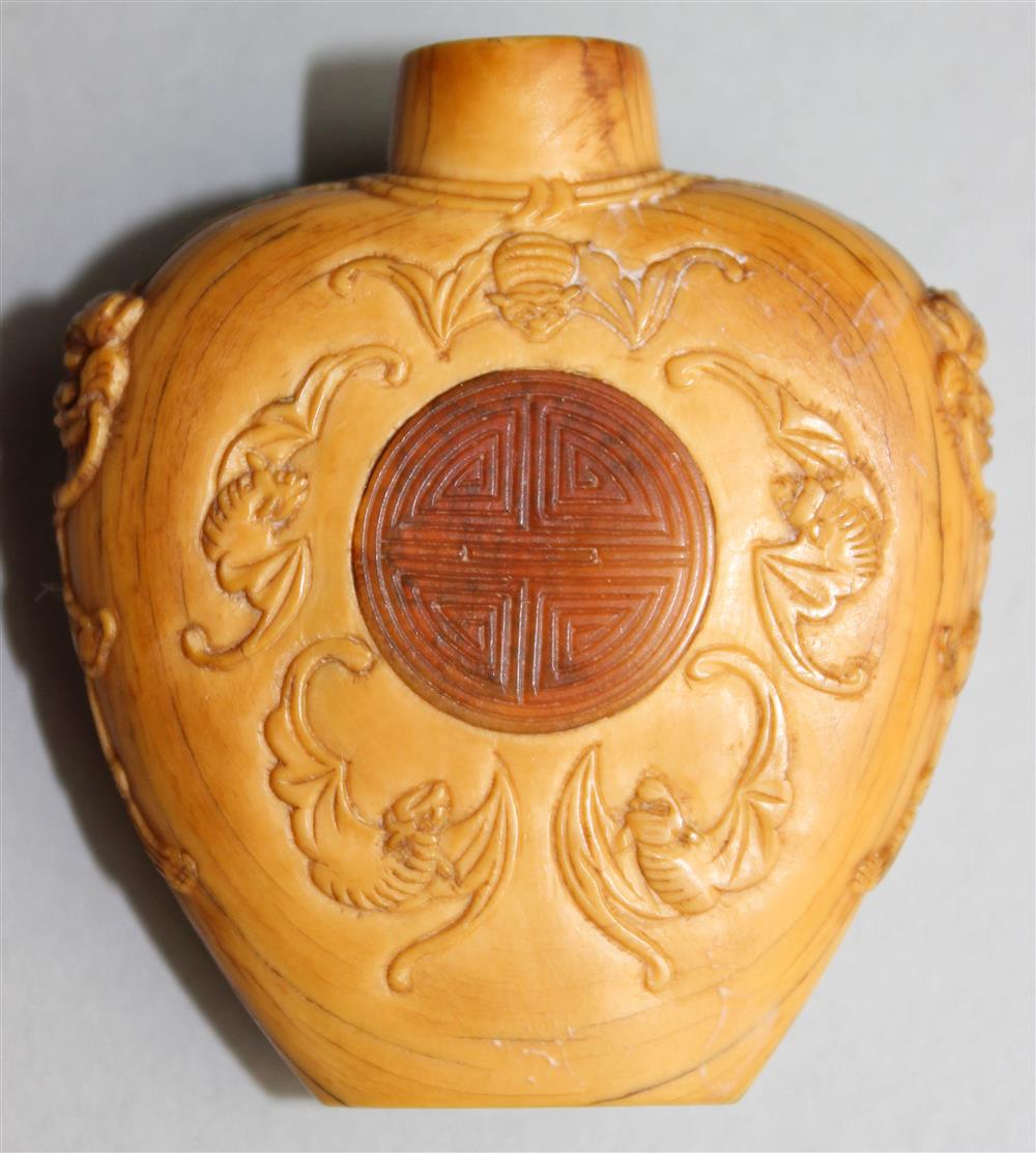 Appraisal: UNUSUAL MOLDED AND INCISED CHINESE SNUFF BOTTLE incised with a