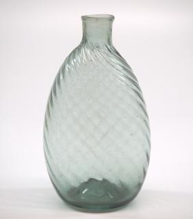 Appraisal: Pattern An early th century pattern-molded glass chestnut flask probably