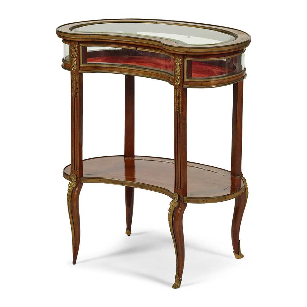 Appraisal: FRENCH MAHOGANY AND GILT METAL MOUNTED KIDNEY-SHAPED BIJOUTERIE TABLE TH