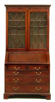 Appraisal: A MAHOGANY BUREAU BOOKCASE late th century the moulded and