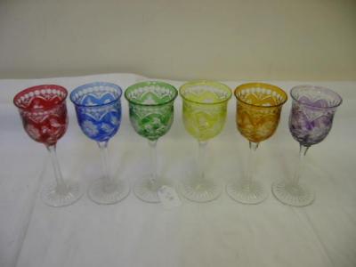 Appraisal: A SET OF SIX HARLEQUIN WINES the baluster bowl wheel