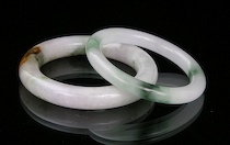 Appraisal: A Pair of Burmese Jadeite Bangle Bracelets Both bracelets are