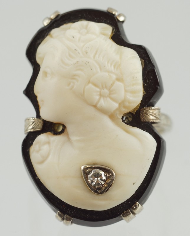 Appraisal: K WG white on black carved cameo portrait ring small