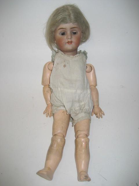 Appraisal: A Simon Halbig bisque head girl doll with brown glass