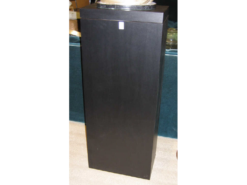 Appraisal: BLACK LAMINATE DISPLAY PEDESTAL having a revolving top h Estimate