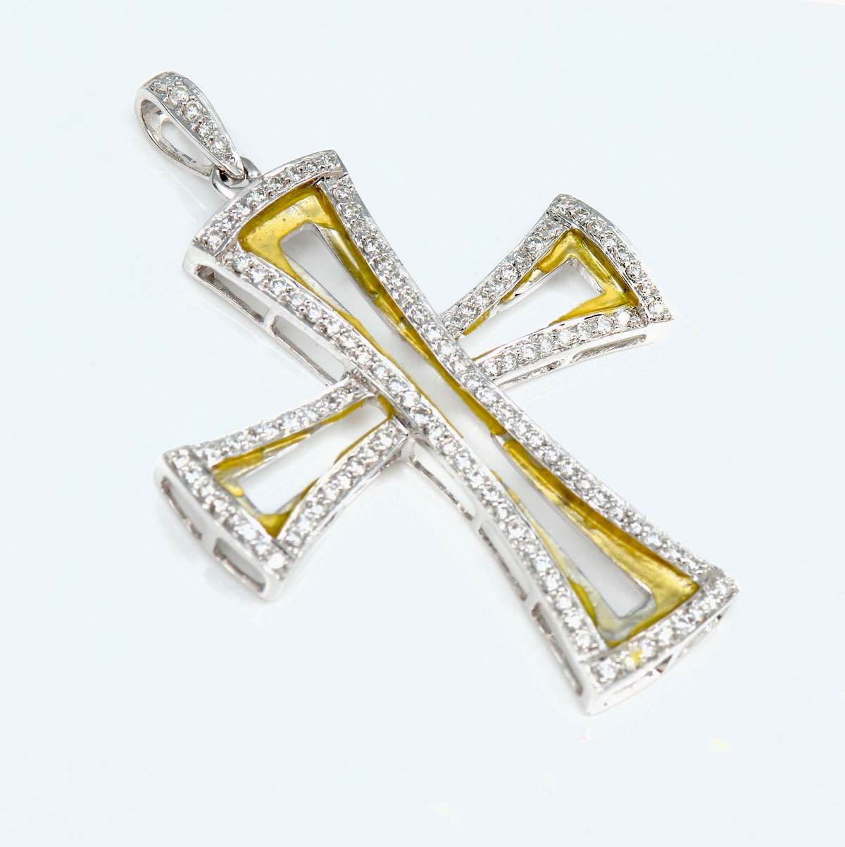 Appraisal: K DIAMOND CROSS PENDANT K white gold cross pendant contains