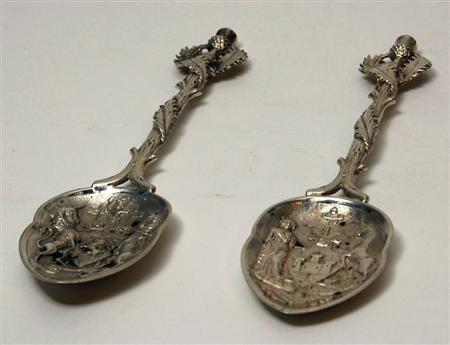 Appraisal: A pair of Edwardian large Scottish silver souvenir spoons Wilson