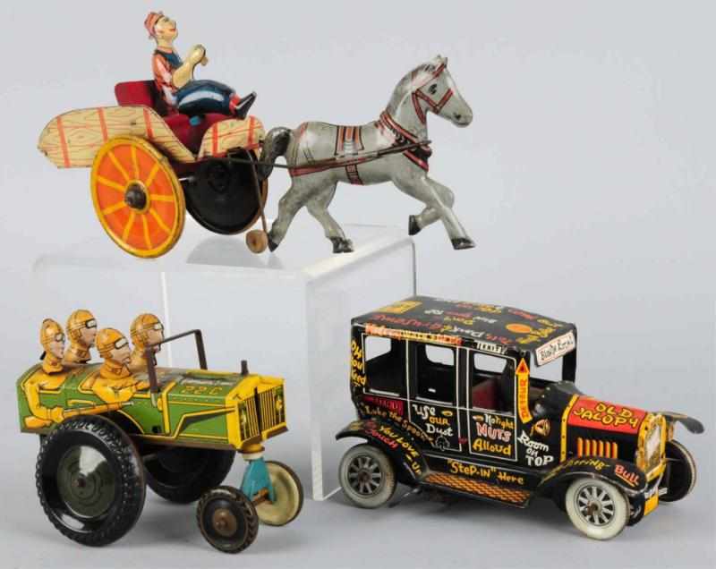 Appraisal: Lot of Tin Litho Wind-Up Toys American Working Includes one