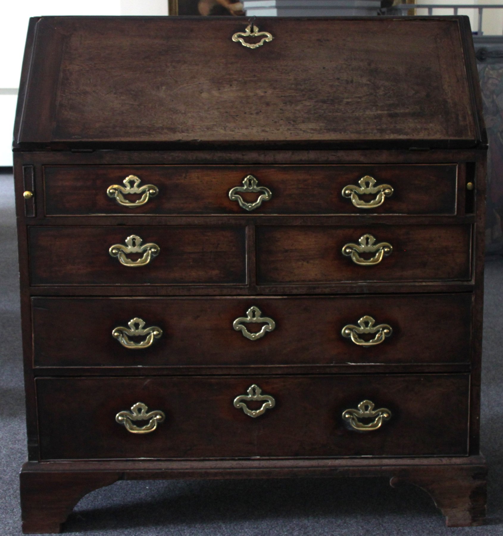 Appraisal: An th Century mahogany bureau fitted drawers pigeon holes and