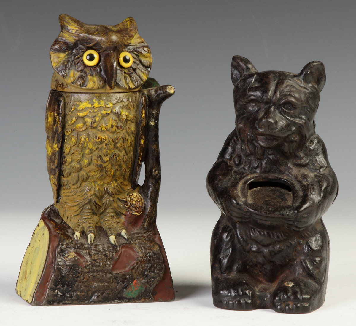 Appraisal: Cast Iron Turning Owl Mechanical Bank Patented