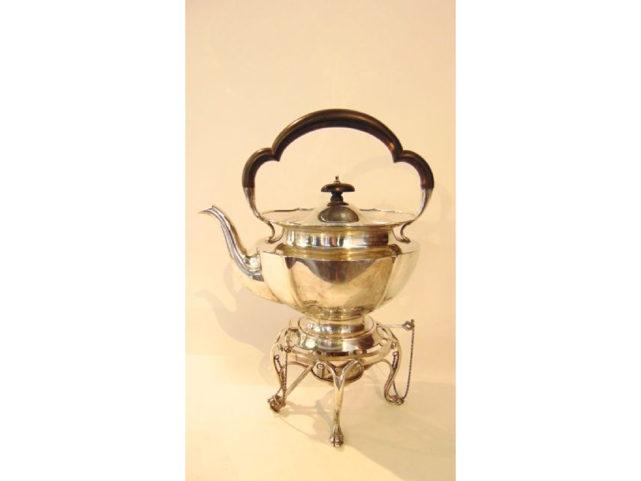 Appraisal: A George V silver tea kettle on stand Walker Hall