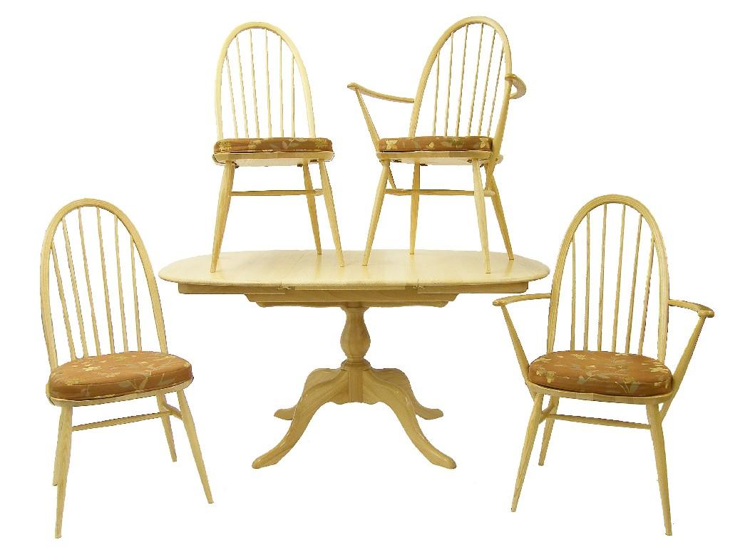 Appraisal: Ercol light elm extending dining table and four chairs the