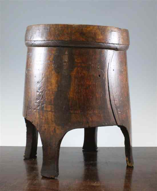 Appraisal: A four legged chestnut mortar holder French Spanish th century