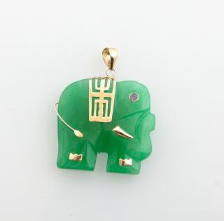 Appraisal: K Yellow Gold Carved Jade Elephant Pendant with a ruby