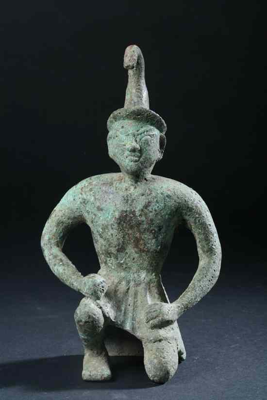 Appraisal: CHINESE ARCHAISTIC BRONZE FIGURE OF ATTENDANT Han Dynasty style Kneeling