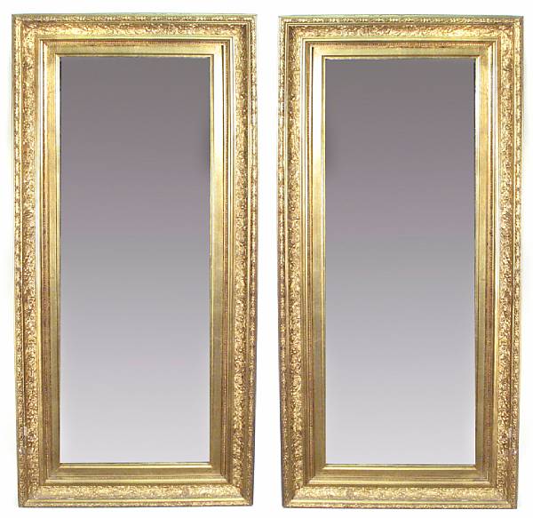 Appraisal: A pair of giltwood and gesso rectangular mirrors height in