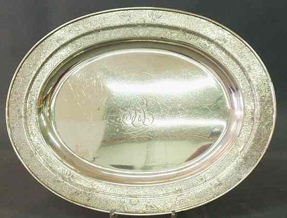 Appraisal: Large oval sterling silver platter with leafy engraved border and