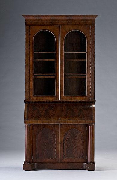 Appraisal: LATE CLASSICAL MAHOGANY SECRETARY BOOKCASE American ca - with cove