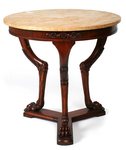 Appraisal: An Empire style center table with marble top on paw