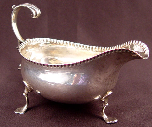 Appraisal: GEORGIAN WILLIAM SUMNER STERLING SAUCE BOAT London hallmarked by William