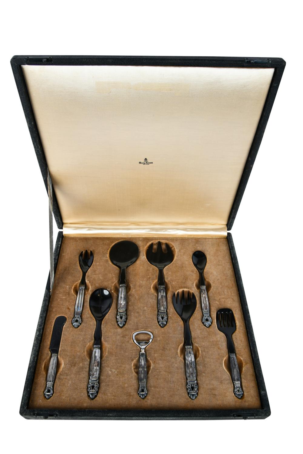 Appraisal: GEORG JENSEN NINE-PIECE SERVING SETAcorn pattern handles marked Sterling Denmark