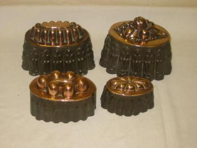 Appraisal: FOUR VARIOUS VICTORIAN JELLY MOULDS in copper and tin the