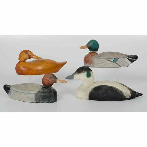 Appraisal: Duck Decoys American a group of four duck decoys two