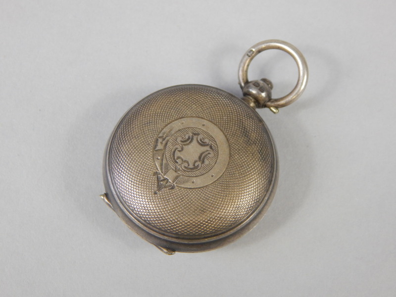 Appraisal: A George V silver sovereign case with engine turned decoration