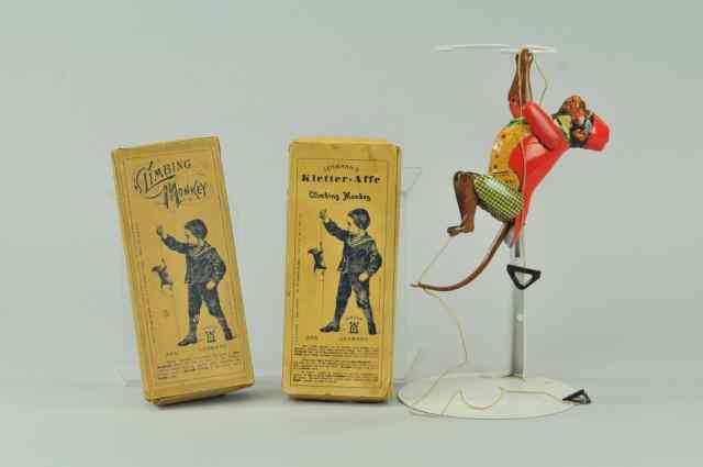 Appraisal: BOXED LEHMANN CLIMBING MONKEY Germany lithographed tin popular pull string