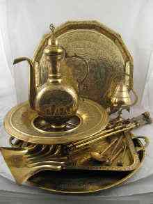 Appraisal: A quantity of brassware including three trays a bowl and