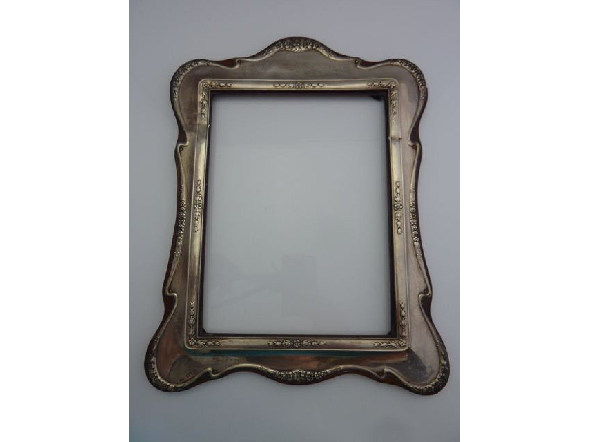 Appraisal: An Edwardian silver picture frame Henry Williamson Ltd Chester the