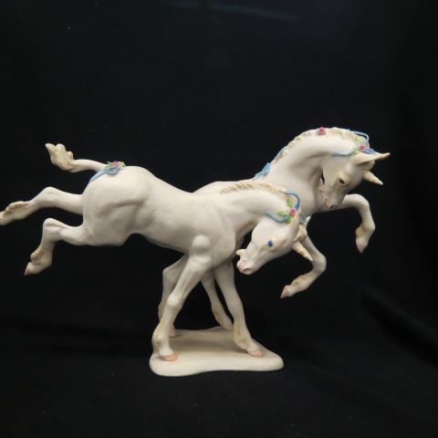 Appraisal: Cybis Porcelain Figurine of Two Horses prancing with bows and