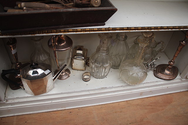 Appraisal: FOUR CUT GLASS DECANTERS a cut glass jug two silver