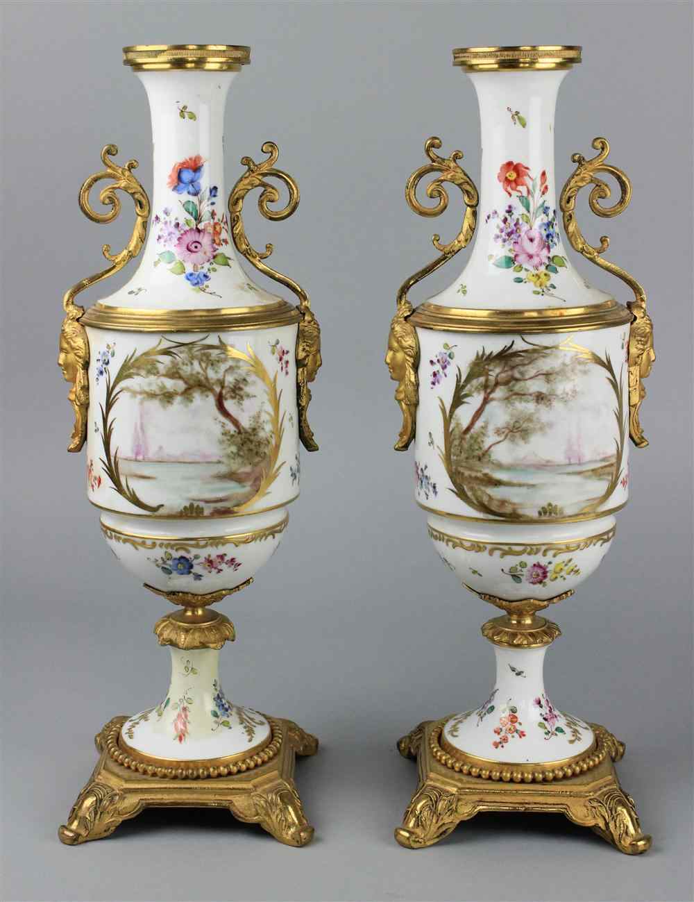 Appraisal: PAIR OF SEVRES STYLE ORMOLU MOUNTED VASES blue crowned monogram