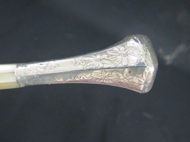 Appraisal: Victorian Sterling Mother-of-Pearl Umbrella ornate floral decoration