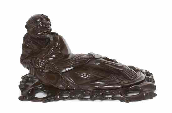 Appraisal: A Chinese Carved Wood Figure of a Monk shown in