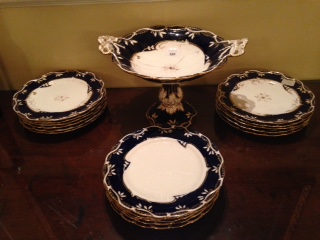 Appraisal: A late Victorian English porcelain dessert service comprising a comport