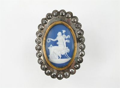 Appraisal: A Continental Jasperware oval plaque depicting a Classical lady representing