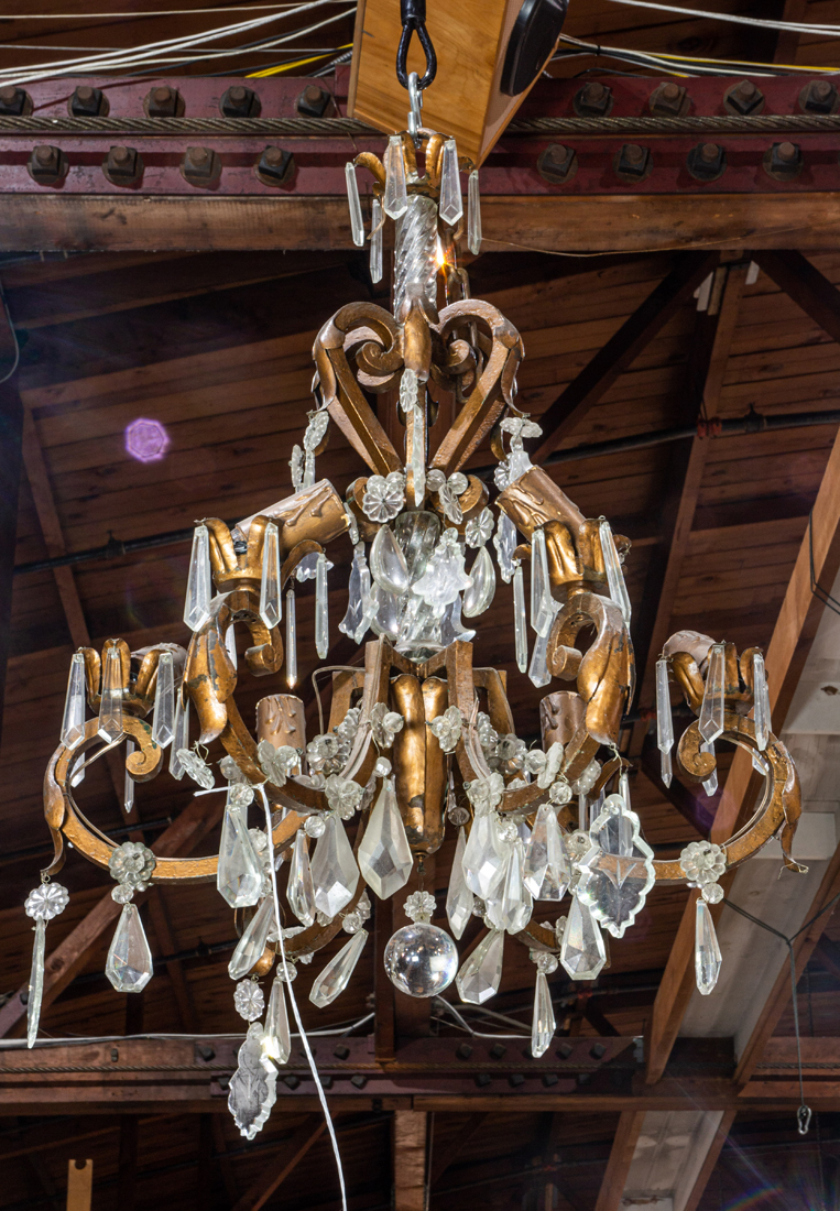 Appraisal: CONTINENTAL CRYSTAL AND PATINATED METAL CHANDELIER Continental crystal and patinated