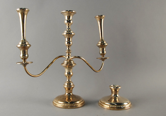 Appraisal: A Pair of Preisner Sterling Candlesticks with weighted bases one